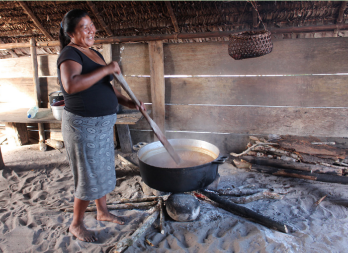 Woman preparing casirie in Guyana. Credit: APA