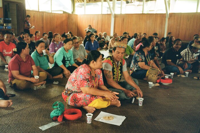 Woman speaking in a meeting in Indonesia